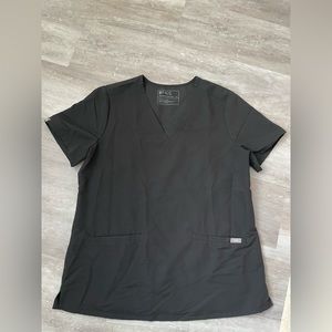 Figs 3 pocket scrub top. Size medium. No flaws